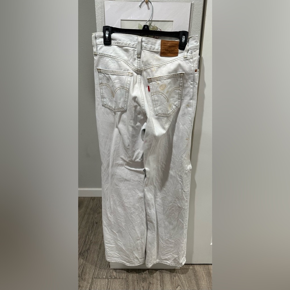 Levi Strauss Jeans Size 26 Ribcage WideLeg (stains on right back pocket and leg)